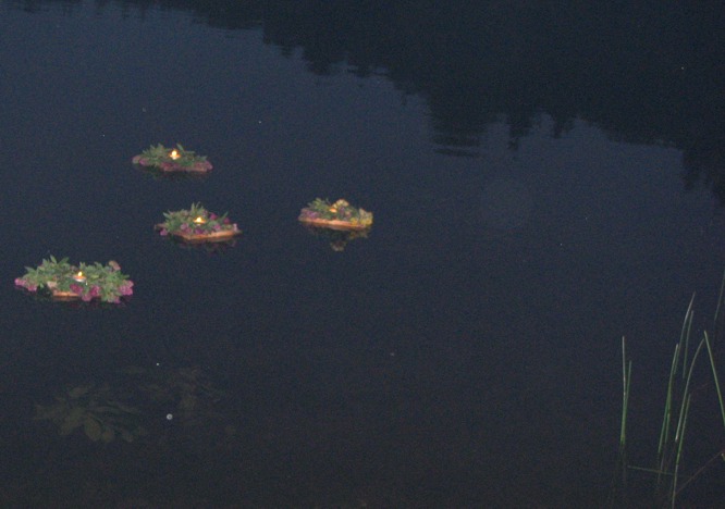 Candles on water at St. John night
